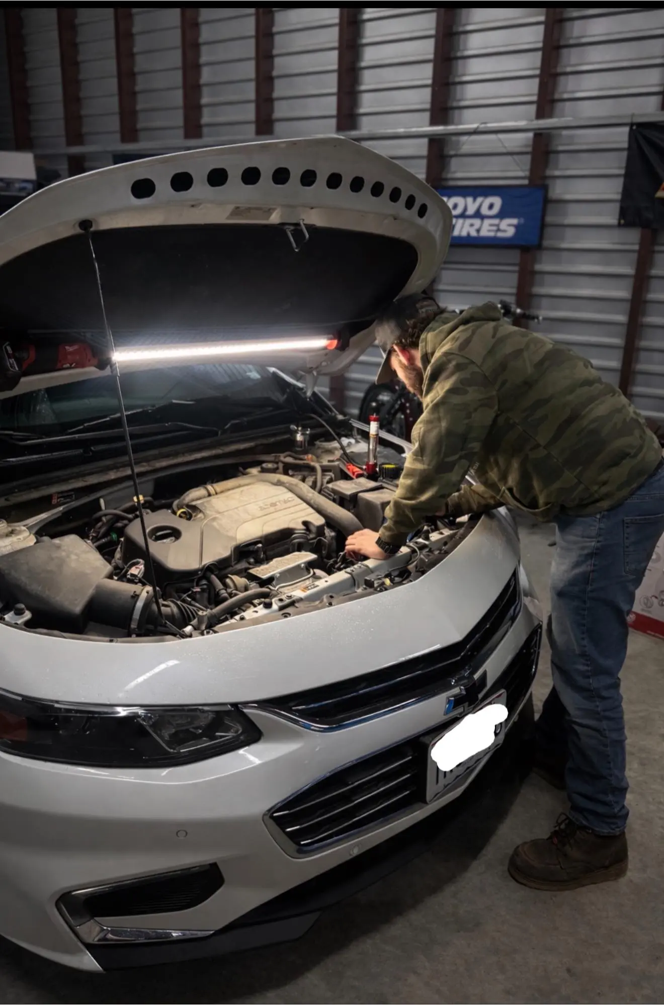 Nick Chapman working on a customer vehicle